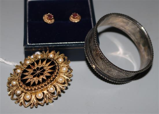 Brooch, earrings & napkin ring.